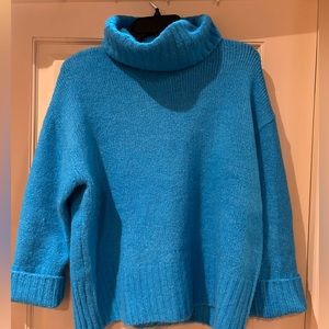 Beautiful bright blue sweater